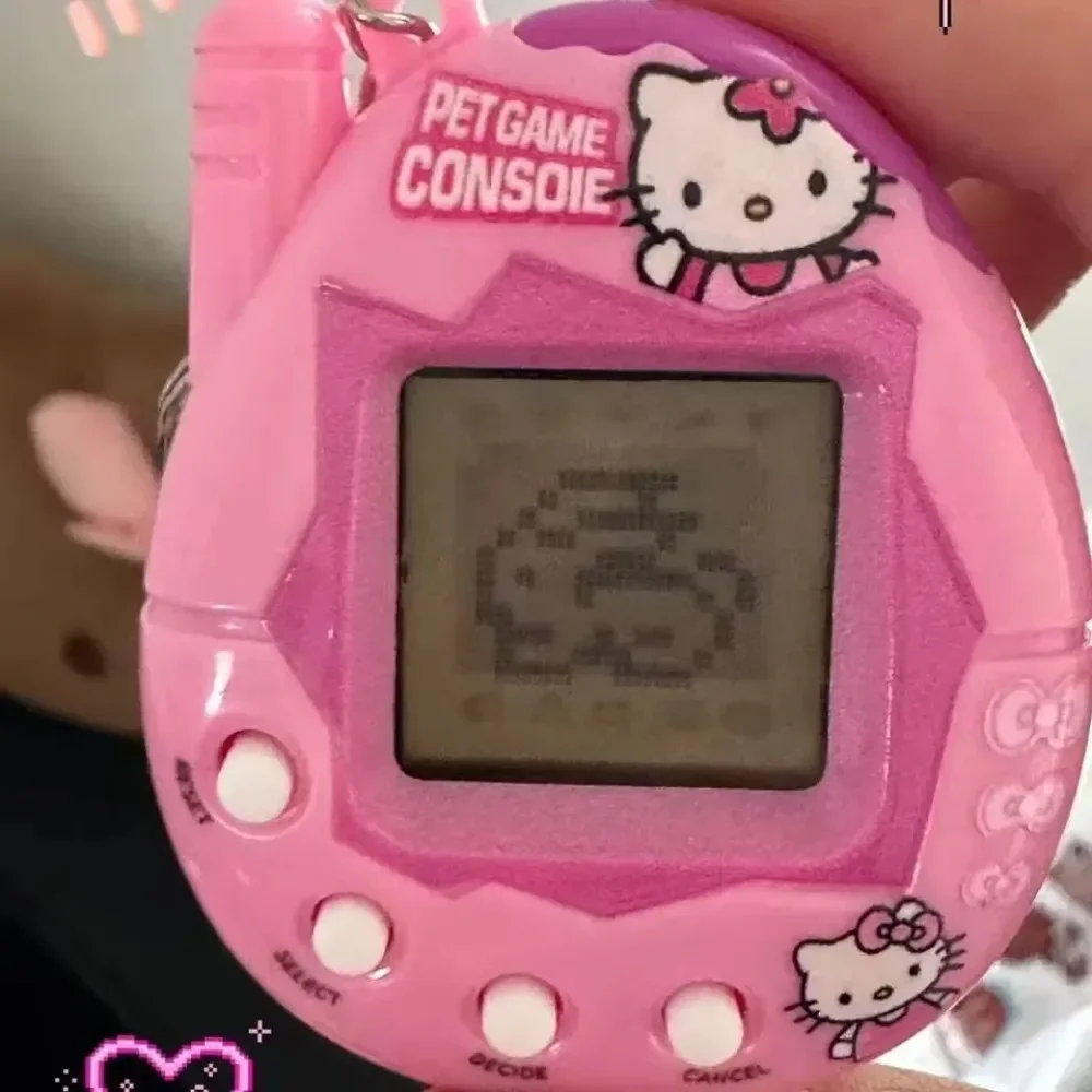 ซานริโอ เฮลโลคิตตี้ มายเมโลดี้ - Tamagotchi Electronic Pet Virtual บทวิจารณ์และราคา